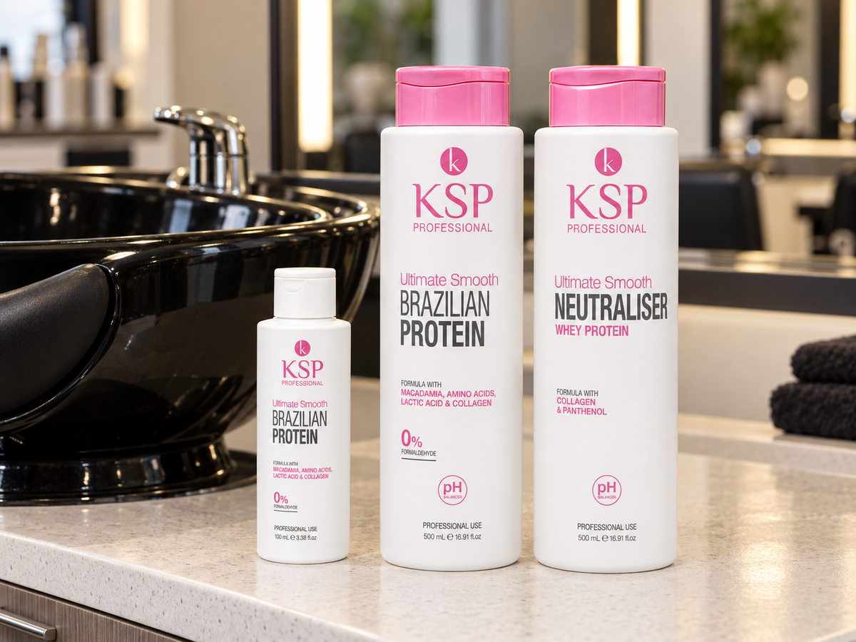 KSP Hair Ultimate Smooth treatment bottles and neutraliser arranged beside a professional salon backwash basin.